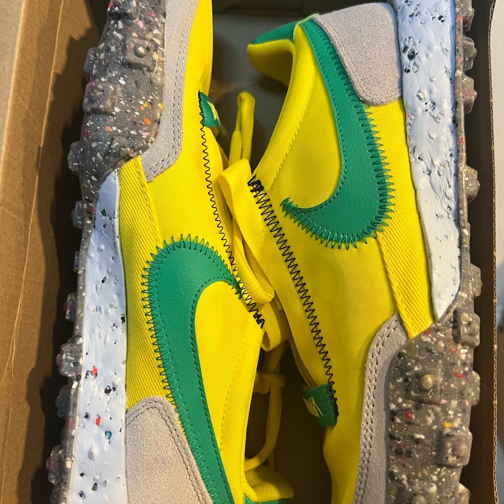 Nike Yellow Sneakers with Green Swoosh and Speckled Sole